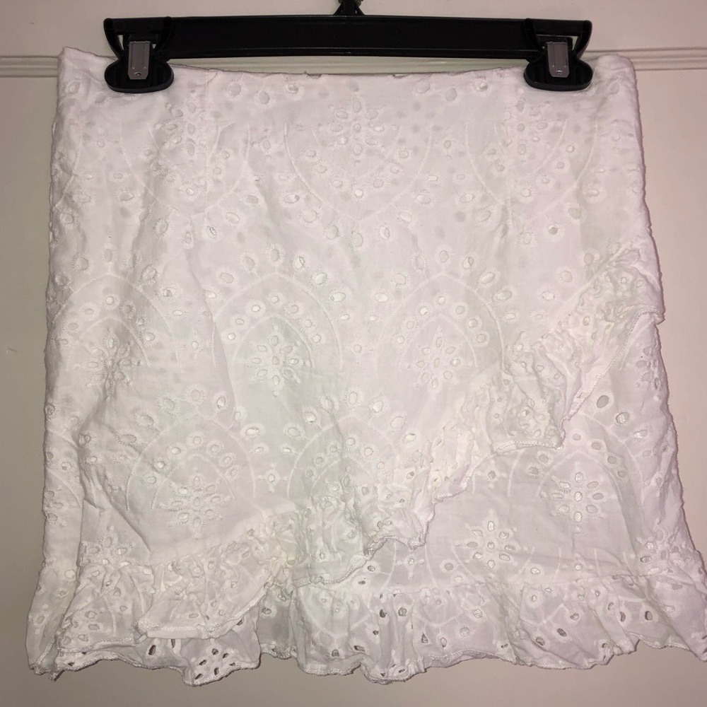 White eyelet mini skirt with ruffle